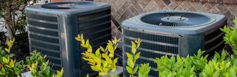 HVAC technician performing AC repair service in Encinitas CA home